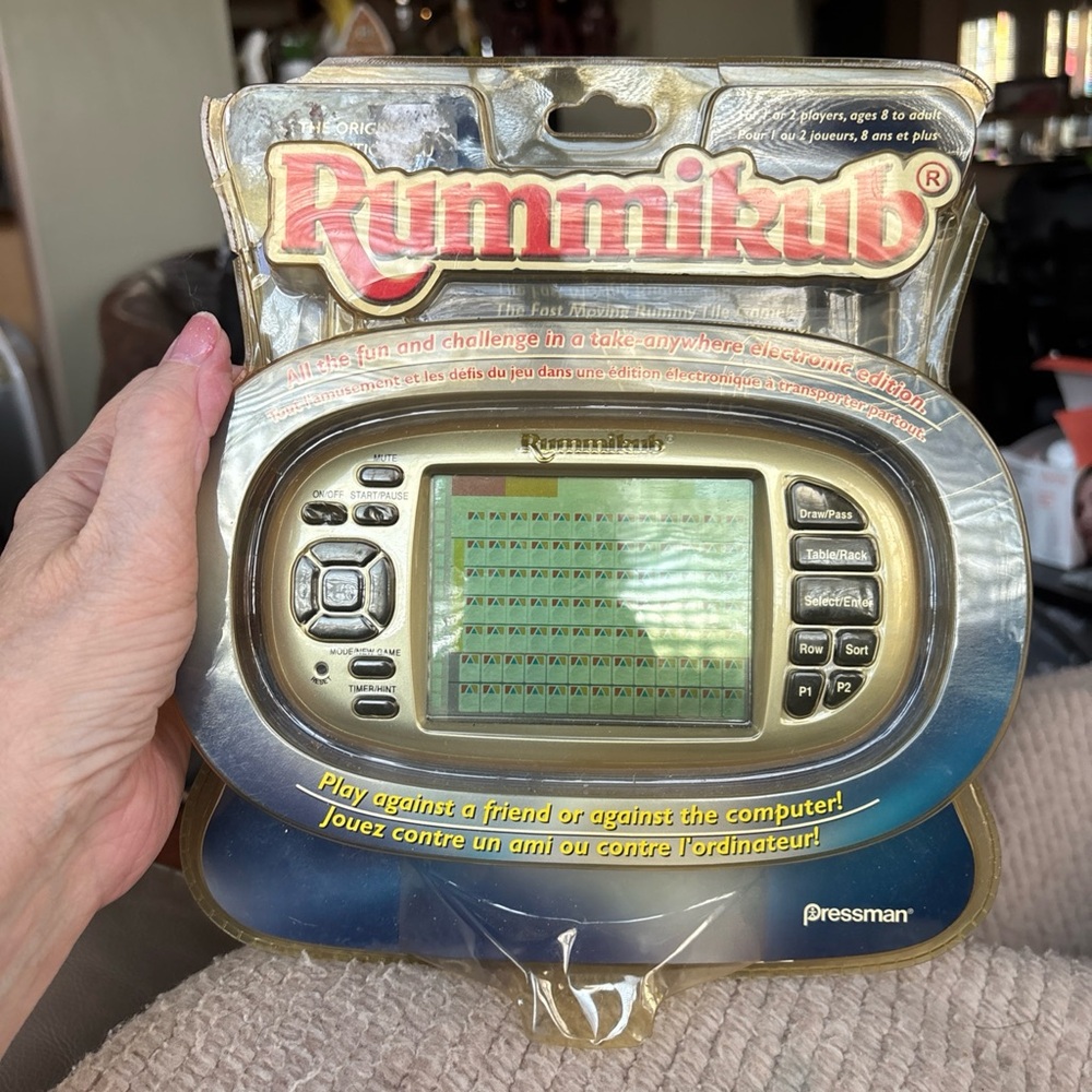 Rummikub Electronic Handheld Game 2008.  New Sealed.  Package damaged